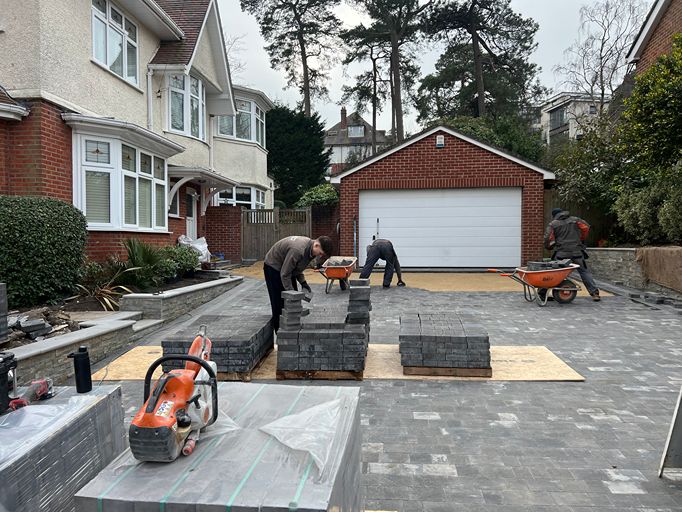 Block paved driveway being installed by landscaping team